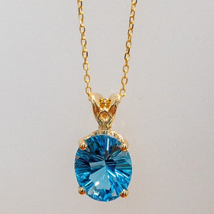 14K Yellow Gold Blue Topaz Pendant