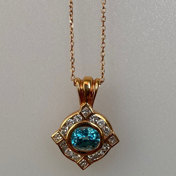 Blue Zircon and Diamond pendant