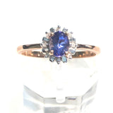 Oval Tanzanite Halo Ring