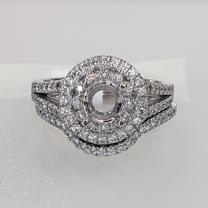 A 14K White Gold Diamond Wedding Set