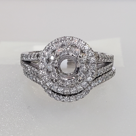 A 14K White Gold Diamond Wedding Set