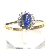 Oval Tanzanite Halo Ring